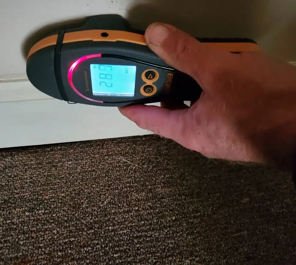 Moisture detection at baseboard during Burst Pipe Cleanup in Jupiter